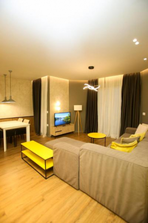 Visar Apartment Yellow